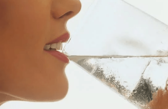 Drinking water in glass